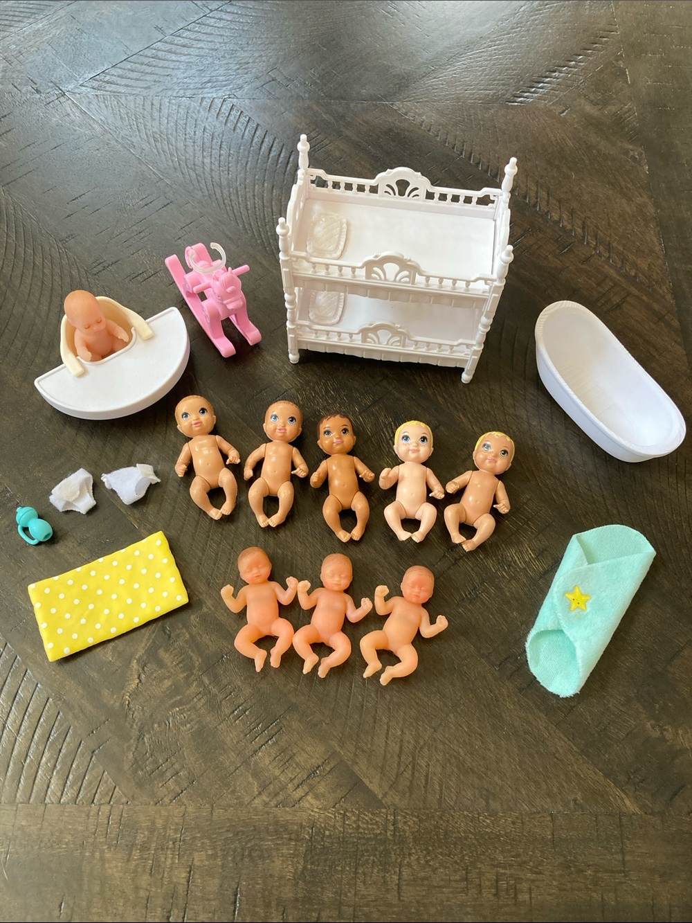 Bundle of 5 Barbie babies and 4 silicone babies with accessories